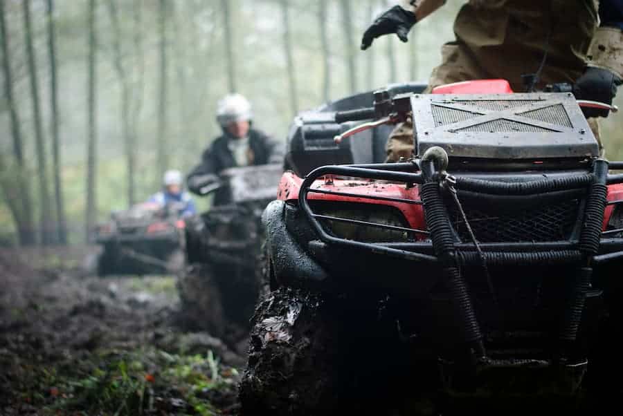 ATV's riding through trail in North Dakota