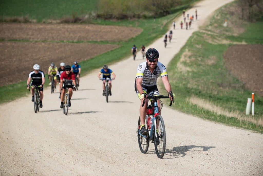 Cyclist navigating on a road race in the Midwest